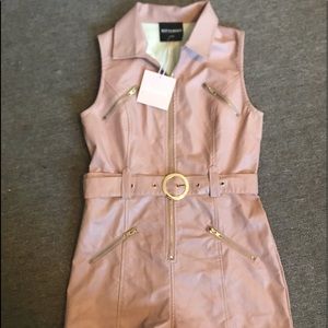 Jessie James Decker Kittenish: Rosie faux leather blush romper.